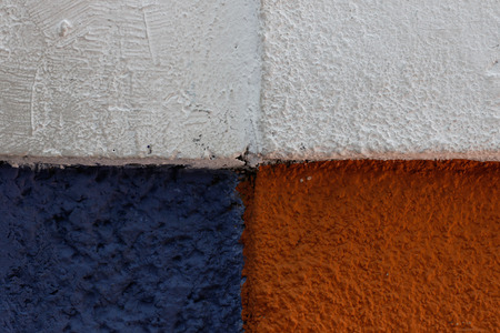 White, red and blue wall textureの写真素材