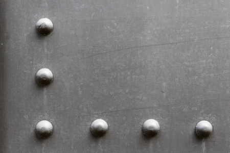 Grey metal with rivets texture