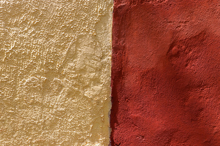 Yellow and red wall textureの写真素材