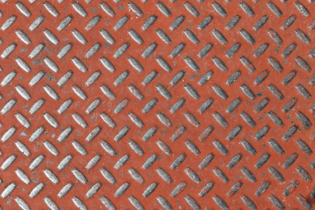 Red ribbed metal plate textureの写真素材