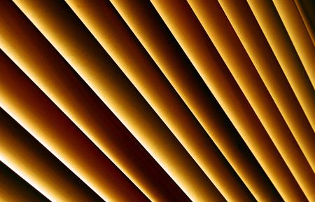 late evening sun creating a pattern on white woodの写真素材