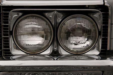 headlights of a 1969 vintage american carの写真素材