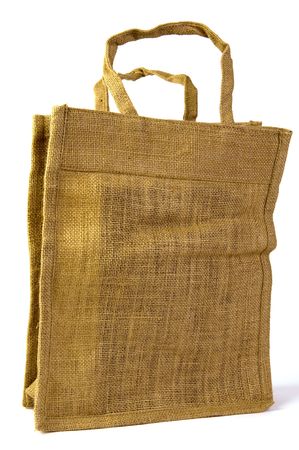 a brown ecological market bag isolated on whiteの写真素材