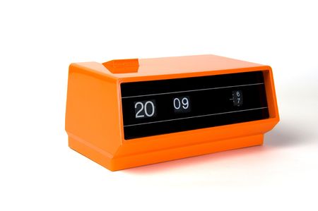 orange design alarm clock from the sixties isolatedの写真素材