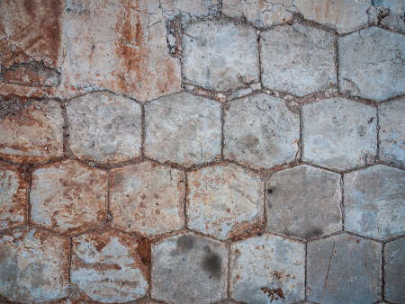 Background of an old gray figured paving slabsの写真素材