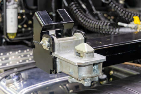New Twistlock on the front corner of the semitrailer. Transporting shipping containers on trucks on...