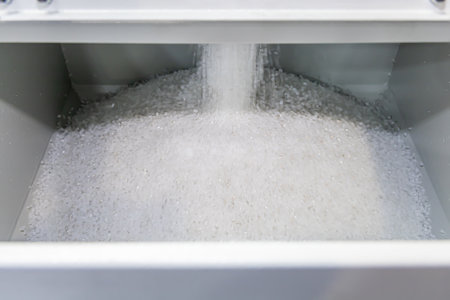 Raw materials for the production of plastic products. The process of filling a metal hopper of an...