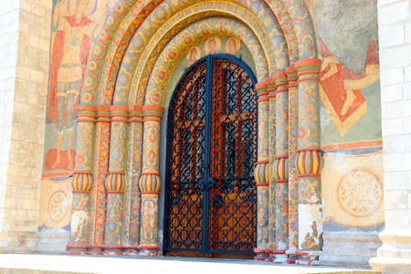 The front door of Assumption Cathedral in Cathedral square of the Moscow Kremlin Moscow Russia