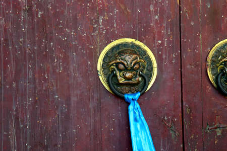 Entering Charchorin in Mongolia through a wooden doorの写真素材