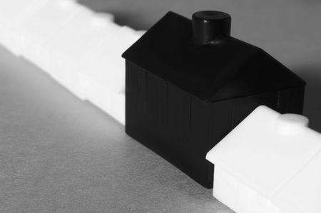 Large house out of place among smaller housesの写真素材