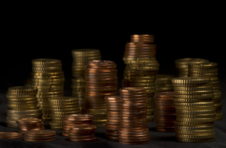 a lot of different high stacked heaps of Euro-Cent coinsの写真素材