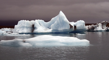 icebergs against a purple sky