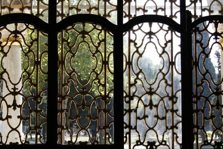 Looking through golden window at Topkapi palace in Istanbulの写真素材