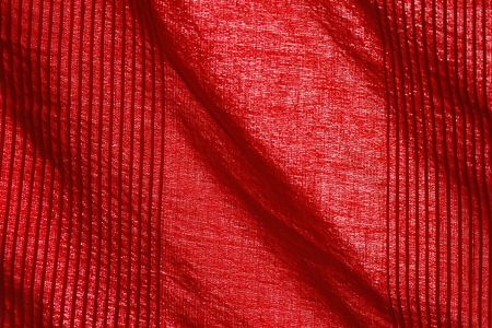 red cotton in close up with wrinklesの写真素材