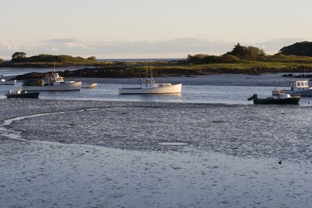 Boats lying dry at Kennebunkport area in Maine in sunset