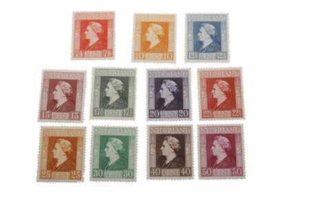 Different vintage stamps with head of Dutch Queen Wilhelmina (1890-1948)のeditorial素材