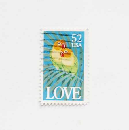 lovebirds on american 52 ct postage stamp of  1991の写真素材