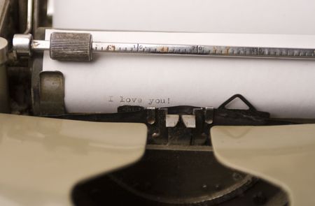 Typing love letter on old typewriterの写真素材