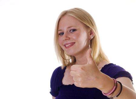 Blonde girl giving the thumbs up signの写真素材