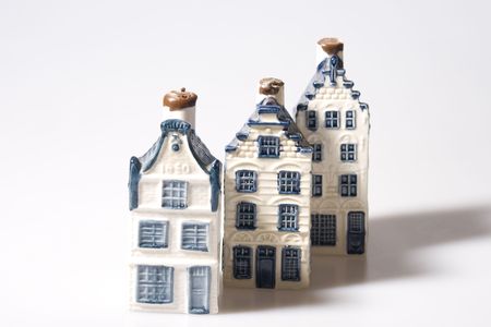 Three miniature stone houses in Delft blueの写真素材