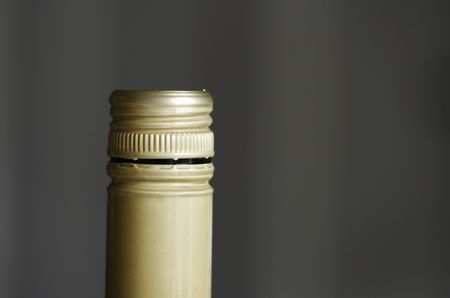Open screwcap capsule on wine bottleの写真素材