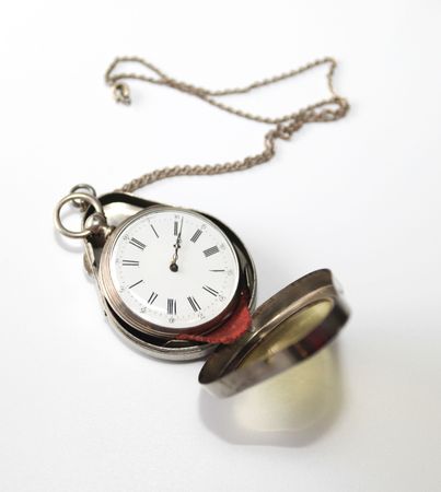 Antique silver pocketwatch in silver caseの写真素材