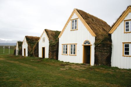 Traditional turf houses in a row in Icelandの写真素材