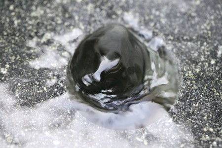 Close up on waterbubble on marble
