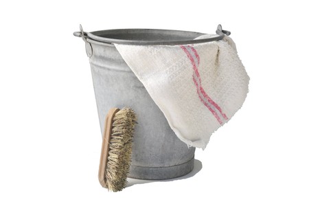 Old zinc bucket with floorcloth and brushの写真素材