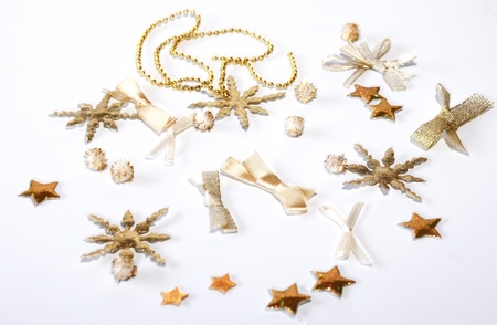 Golden christmas decoration on a white backgroundの写真素材