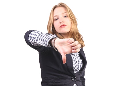 Blonde girl with downward thumbの写真素材