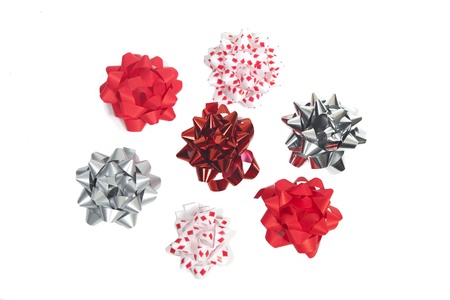 Seven colorful bows on whiteの写真素材