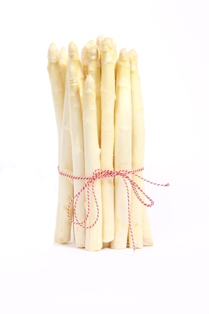 Stack of asparagus with ribbonの写真素材