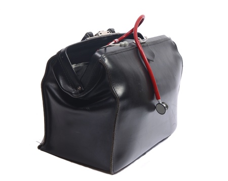 Leather doctor's bag with small red stethoscope for childrenの写真素材