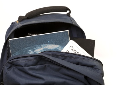 Close up of a blue backpack with studybooksの写真素材