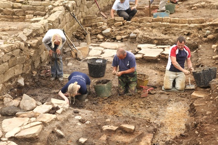 Archaeologists at excavations at Roman Vindolandaのeditorial素材