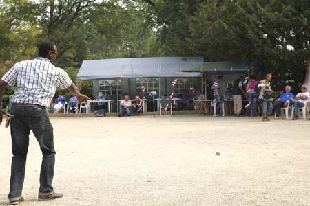 GRONINGEN, THE NETHERLANDS-AUGUST 20TH: Man playing the game of petanque at the Martini Masters tournament in Groningen, the Netherlands on 20th of August, 2011のeditorial素材