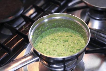 Mashy peas in a pan on the stoveの写真素材
