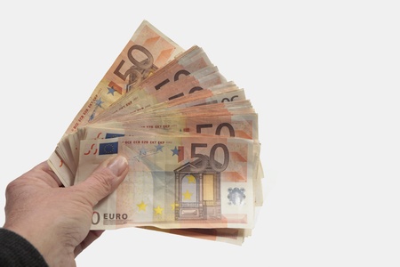 Big pack of fifty euro bills in handの写真素材
