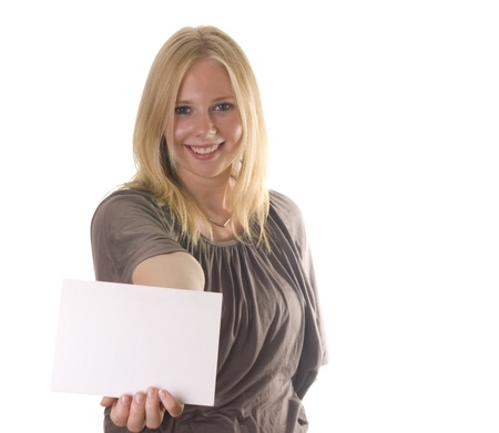 Young blonde woman holding a blank cardの写真素材
