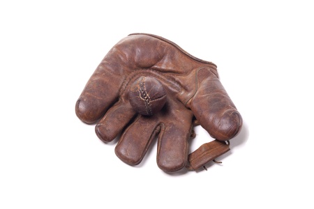 Vintage leather baseball glove with ballの写真素材