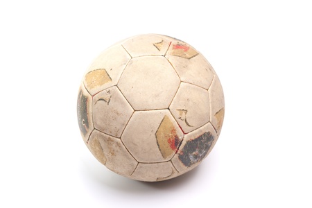 Used leather soccerball on whiteの写真素材