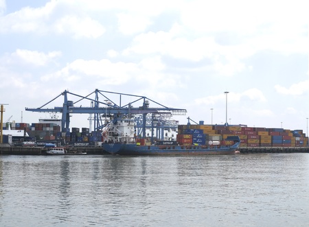 NETHERLANDS- JUNE 26: Container stack in harbor of Rotterdam on June 26, 2012. Rotterdam is the largest port in Europe and the number three busiest port in the world only surpassed by Shanghai and Singapore.  A large extension of the port of Rotterdam (Maのeditorial素材