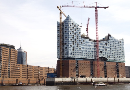 HAMBURG, GERMANY- JUL 29: Construction site of the new Elbphilharmonic building in Harbor City in Hamburg. It will be the tallest inhabited building of Hamburg.のeditorial素材