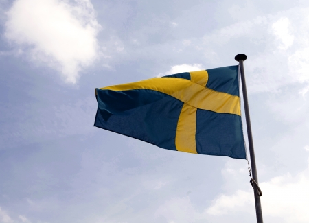 Swedish flag on a poleの写真素材