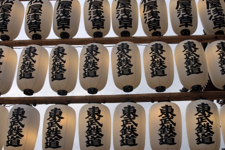 Beautiful Japanese lanterns in black and white  hanging in Tokyo at duskのeditorial素材