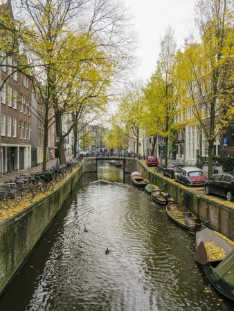 AMSTERDAM, NETHERLANDS-NOV 21: Canal in Amsterdam on Nov 21,2012. Amsterdam has been called the "Venice of the North" for its more than 100 KM kilometers of canals, about 90 islands and 1,500 bridgesのeditorial素材