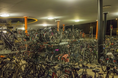 GRONINGEN, NETHERLANDS-OCT 17: Bicycle parking at main station of student town Groningen on Oct 17, 2012. Groningen is in the world top five of best bike cities (57% of all transportation within the city is by bike); のeditorial素材