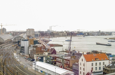 AMSTERDAM, NETH-FEB 22: View on the river IJ and trainstation in Amsterdam on Feb 22, 2012のeditorial素材