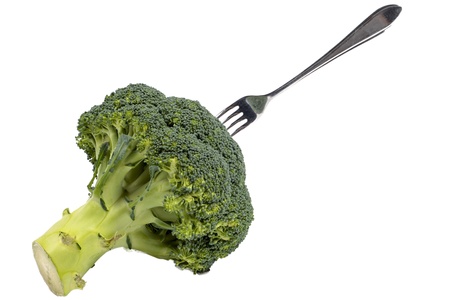 Green broccoli with forkの写真素材
